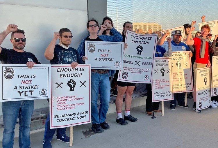Rail workers held protest on overpass in Lincoln, Nebraska, Nov. 2 to show BNSF Railway CEO Katie Farmer, who was passing by on a train, that they were ready to fight for better contract.