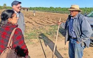 Socialist Workers Party candidates Ellie GarcĂa and Joel Britton, left, visit California farmer near Fresno in 2022 to discuss water access, other challenges facing small producers, need to forge a worker-farmer alliance.